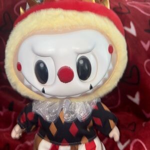 Harlequin Clown Figure with Red and Black Outfit